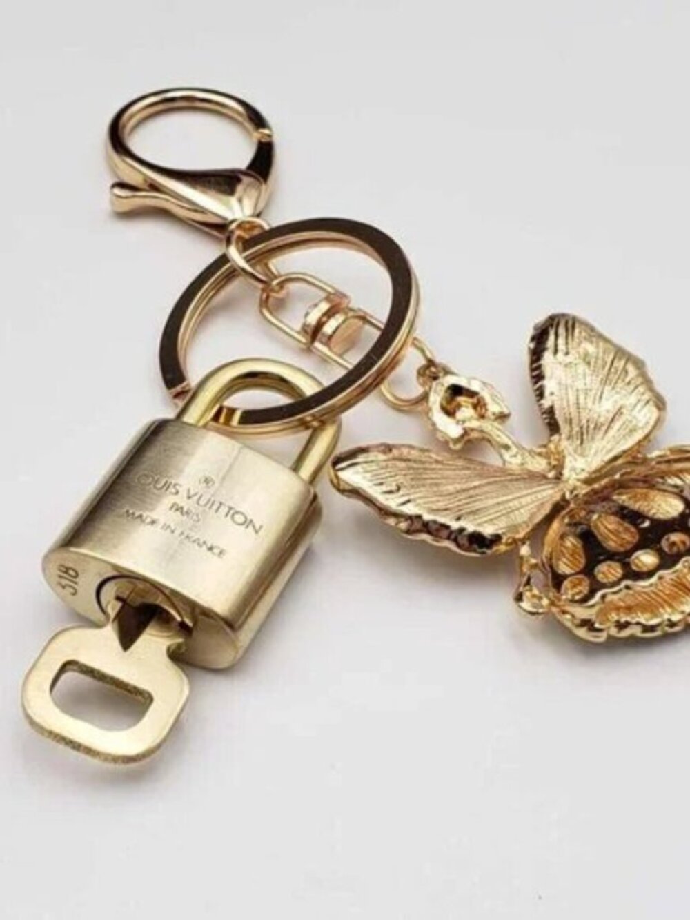 Authentic LV Gold Padlock & Key 🔑 Designer Bag Charm w/ Unbranded Fairy Charm - Picture 4 of 7